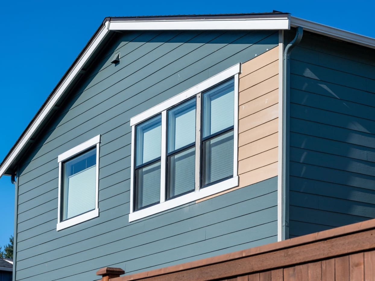 New siding going onto the side of a house