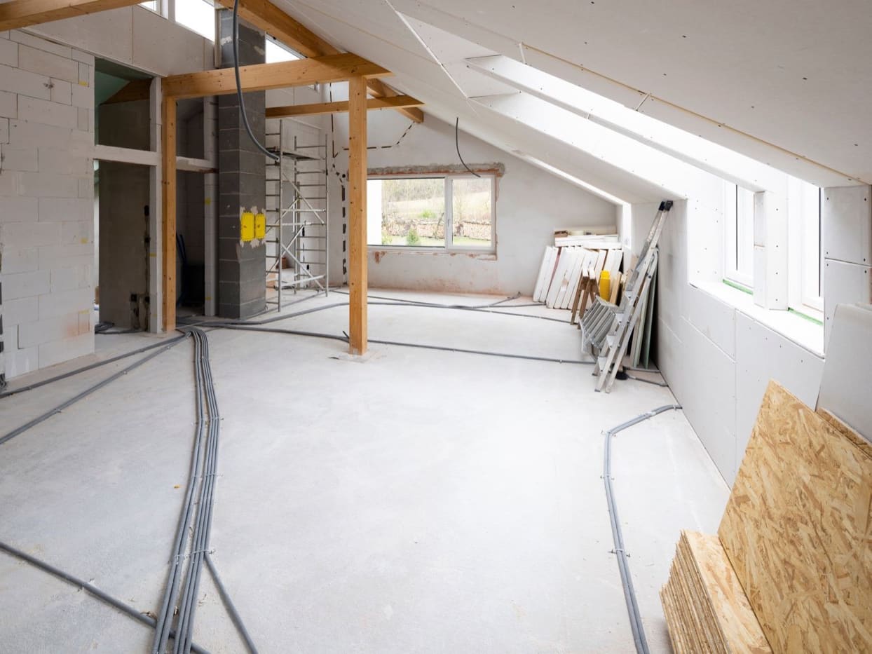 A kitchen with new cabinets during a remodel